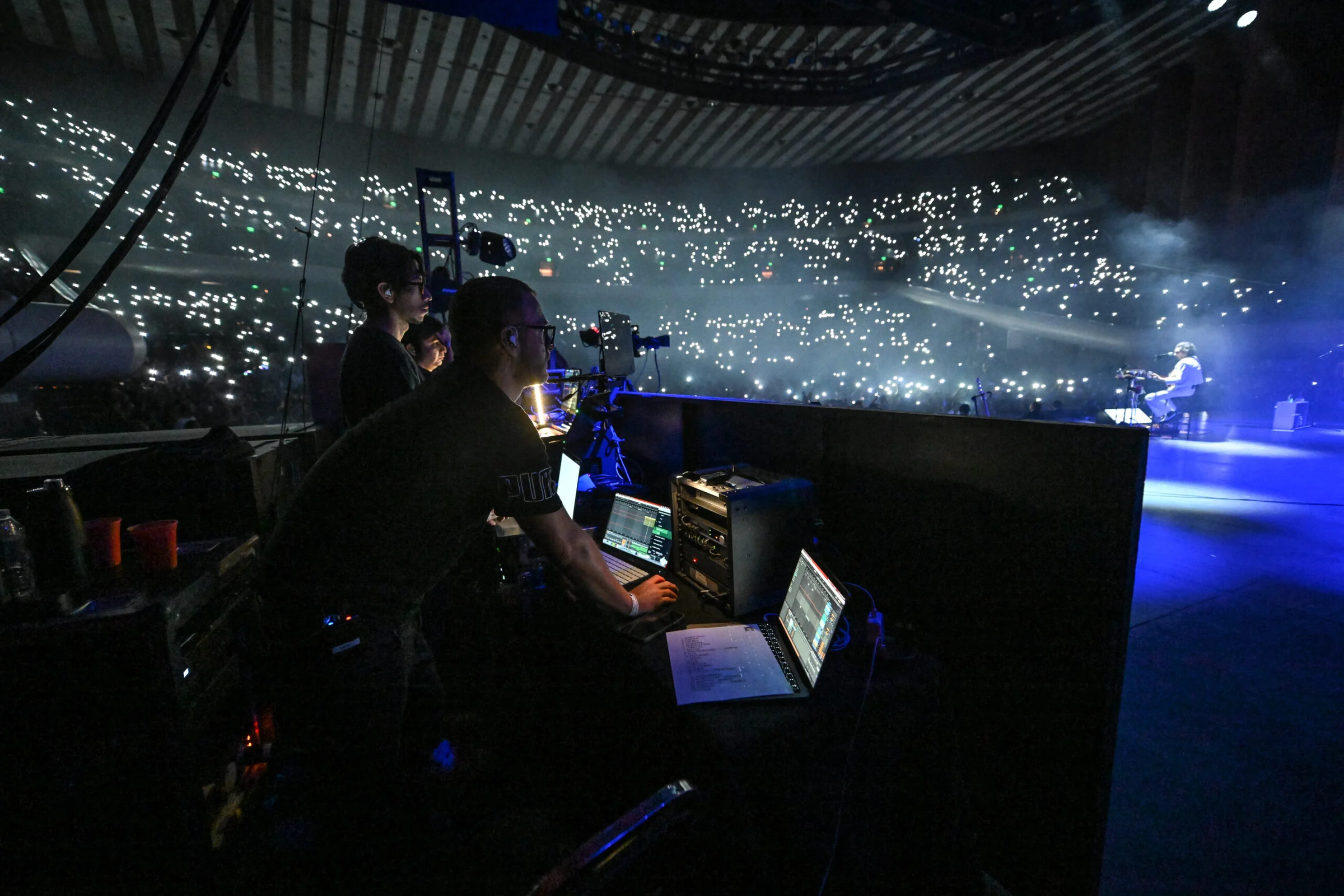 CLR technicians operating a live performance from beside the stage